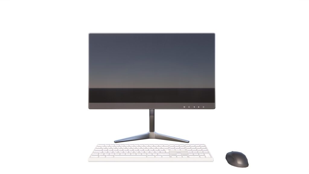 Un ordinateur portable connecté à un écran externe sur un bureau.