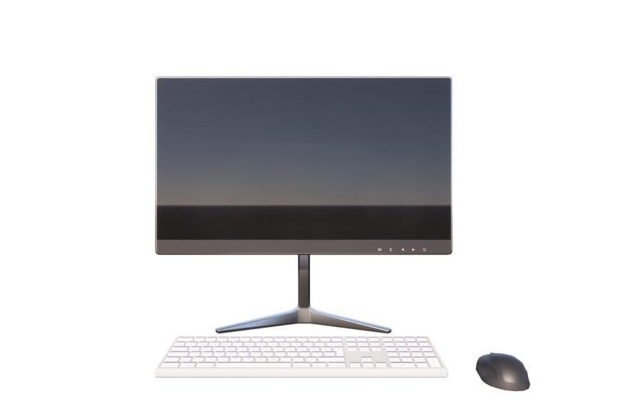 Un ordinateur portable connecté à un écran externe sur un bureau.